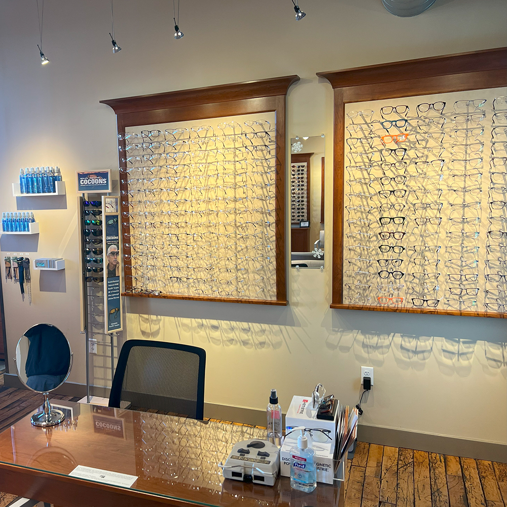 wide angle shot of the waiting room area and optical shop displays at the optical shop in Northampton MA